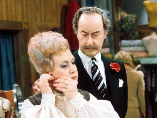 Captain Peacock looks disapprovingly at Mrs. Slocombe.