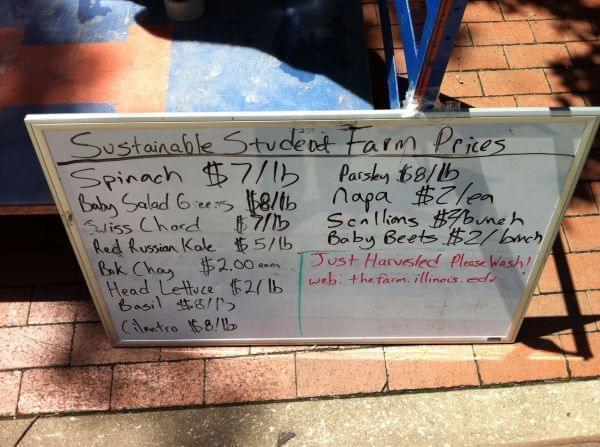 A sign at a farmers market
