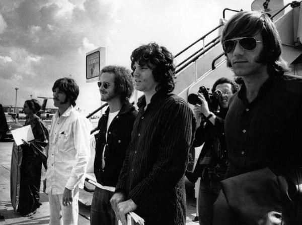 Ray Manzarek (far right) stands with fellow members of The Doors