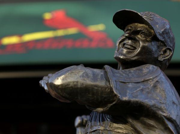 A statue of former St. Louis Cardinals baseball player Stan Musial stands outside Busch Stadium in St. Louis.