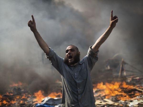 A supporter of ousted Islamist President Mohammed Morsi shouts during clashes with Egyptian security forces in Egypt