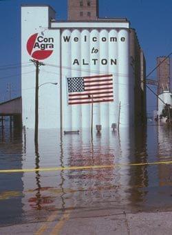 Flood waters surround a grain elevator in Alton, Illinois.