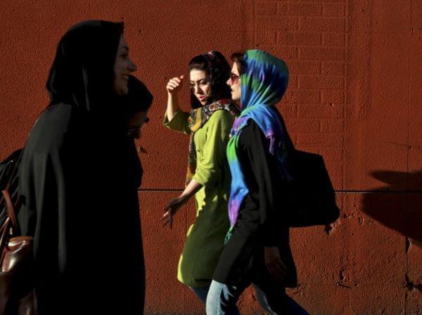 Iranian women, shown here in downtown Tehran, are among groups in the country pushing for social and economic change.