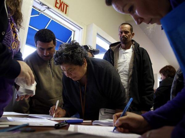 Hundreds in California rushed to get health insurance just before the deadline.